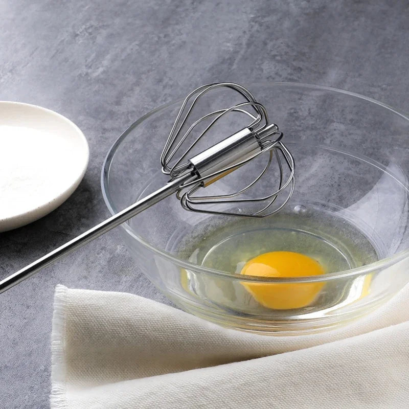 Hand Pressure Egg Beater