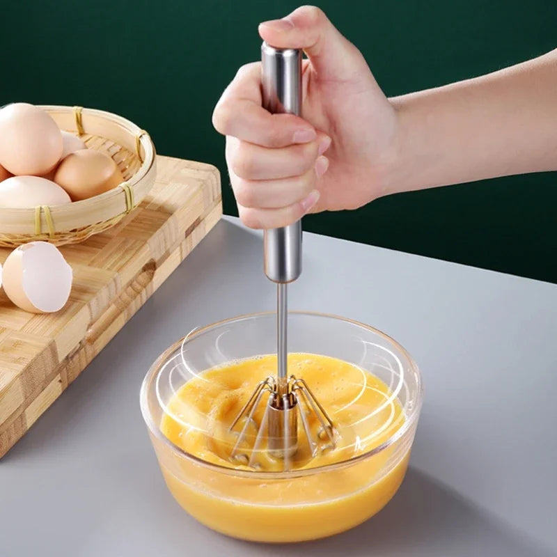 Hand Pressure Egg Beater